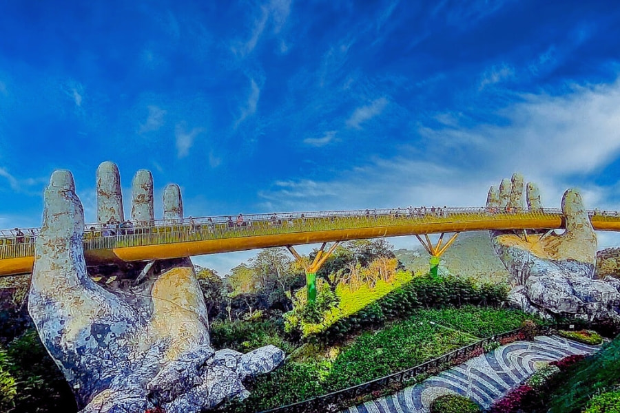 Famous Golden Bridge held by giant hands in Ba Na Hills, Da Nang – Auasia Travel